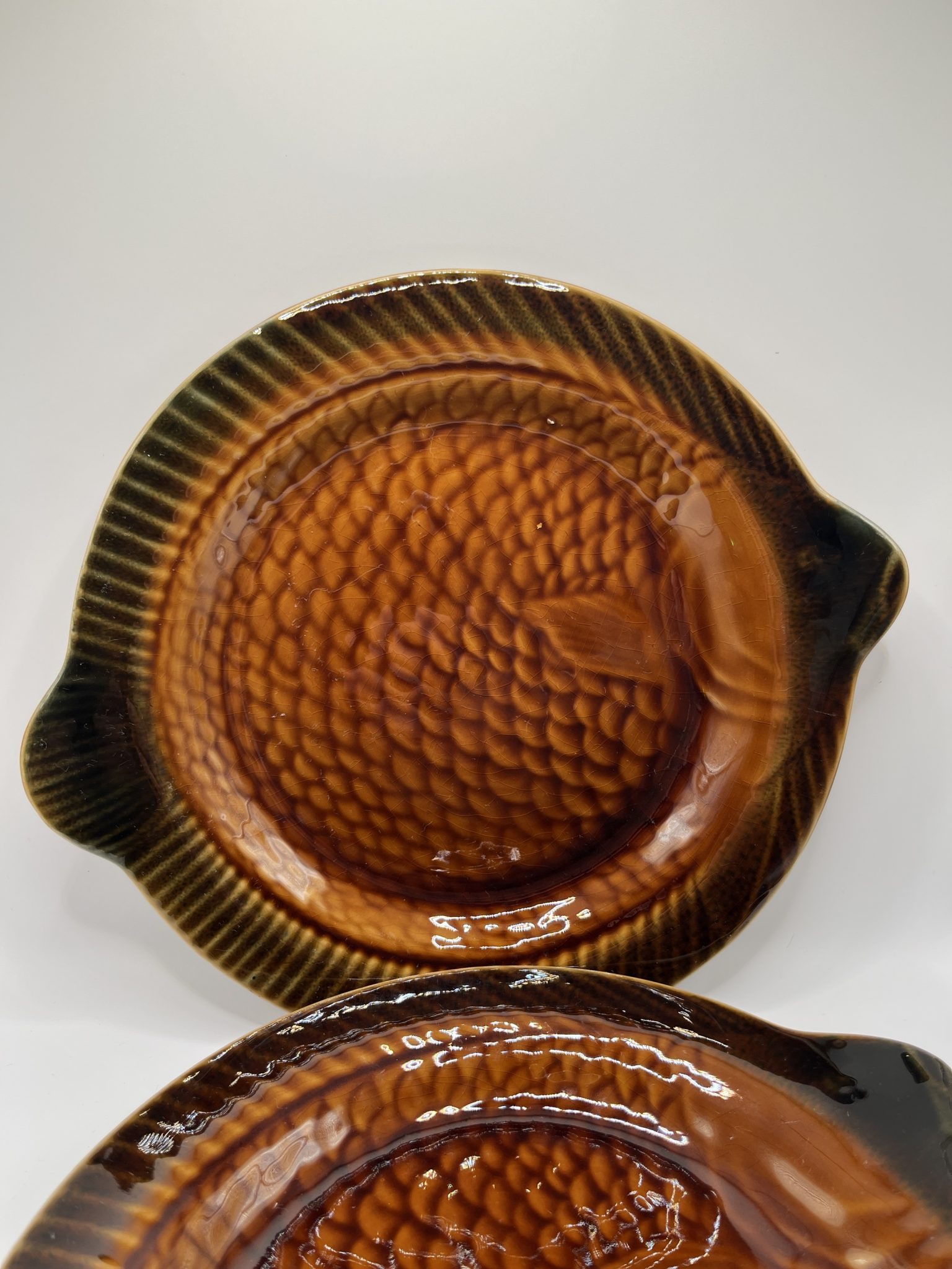 Paire d'assiettes décoratives, tête d'africain, africaine, en céramique