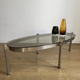 Table basse ovale vintage chrome et verre fumé 70s