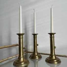 Trio de bougeoirs à systèmes en laiton début XXème